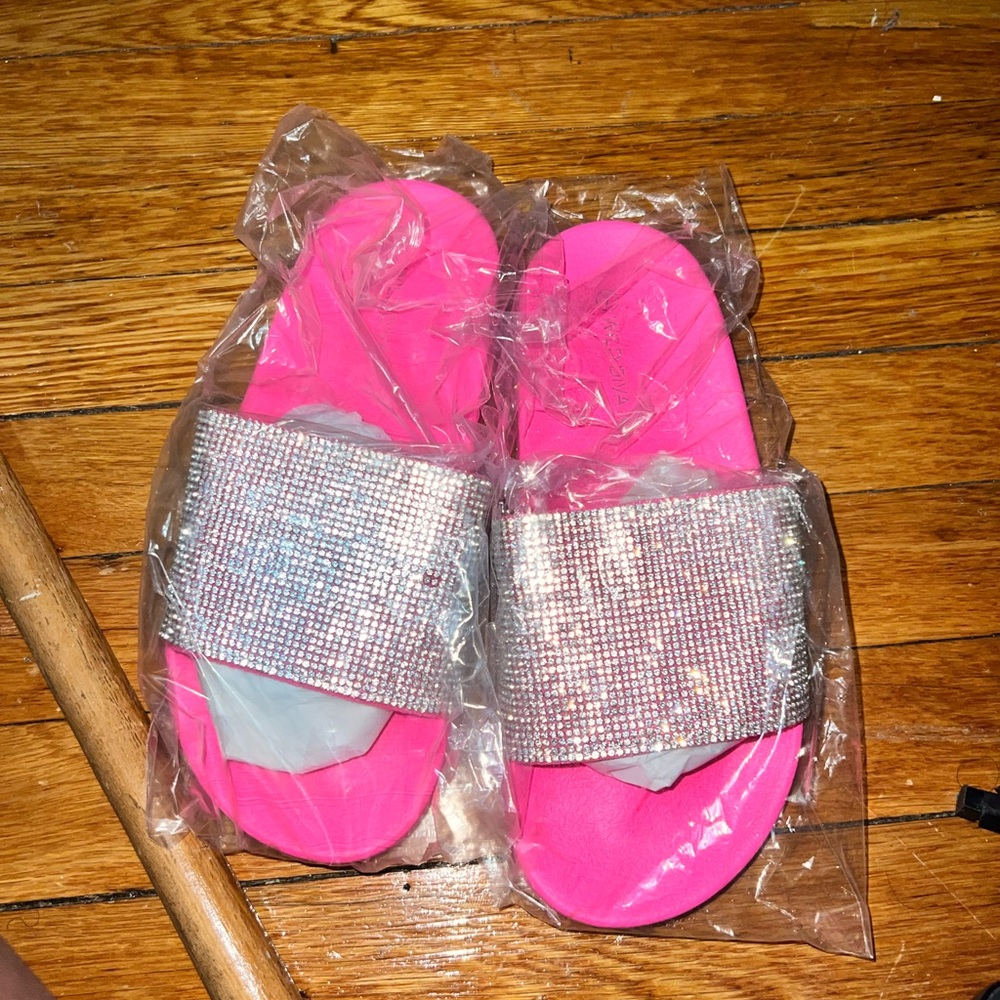 Never worn pink slides